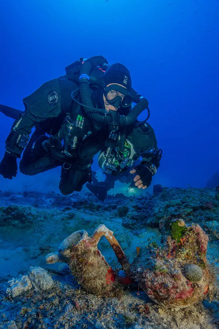 Archaeologists excavating the famous ancient Greek shipwreck that yielded the Antikythera mechanism have recovered more than 50 items including an intact amphora; a large lead salvage ring; two lead anchor stocks (possibly indicating the ship’s bow); fragments of lead hull sheathing; and a small and finely formed lagynos (or table jug). (Photo by Brett Seymour, EUA/ARGO)