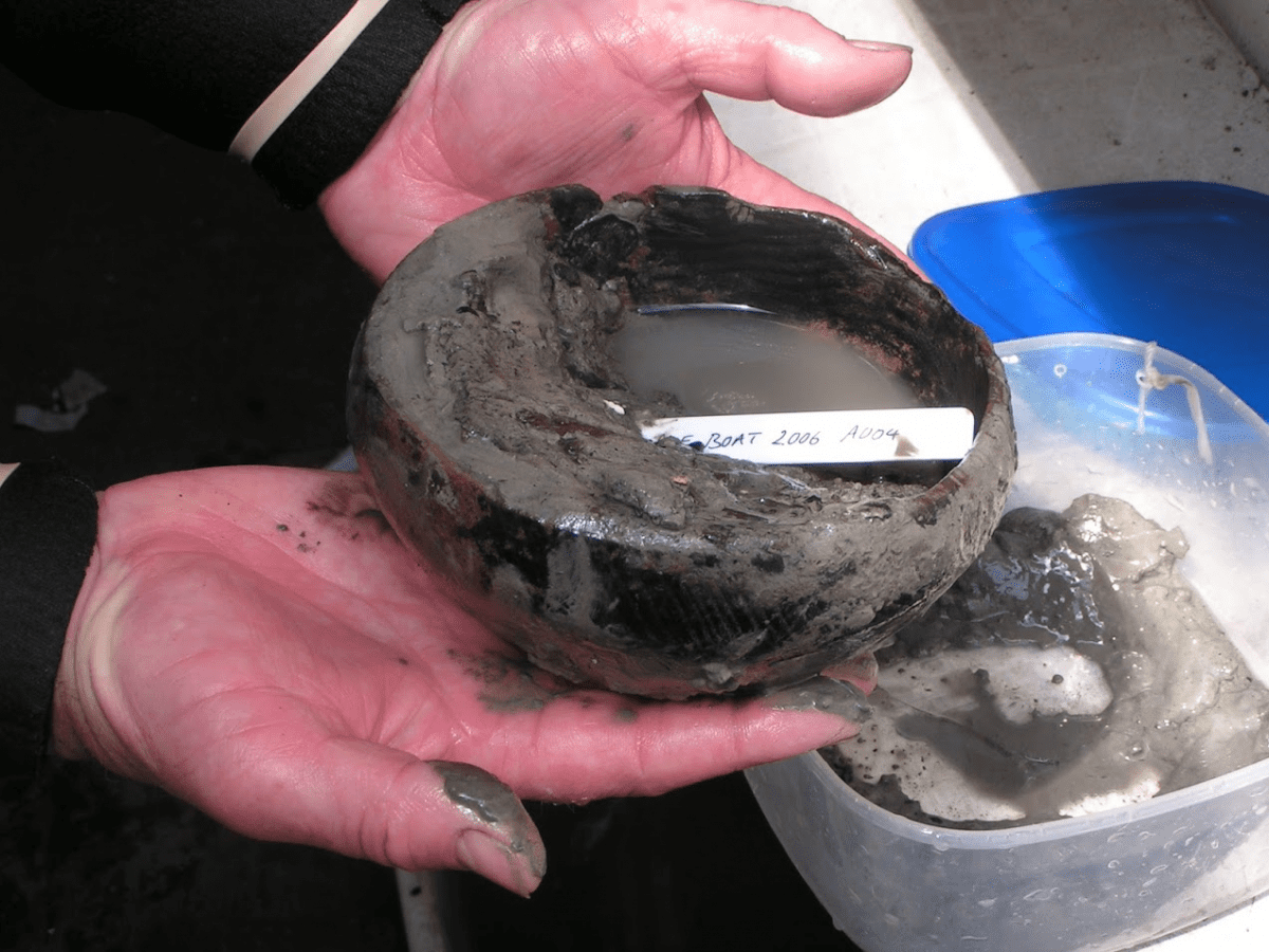 A wooden bowl found on the Axe Boat which lies in the mud bank on the west side of the Axe River in south Devon. Copyright Devon County Council