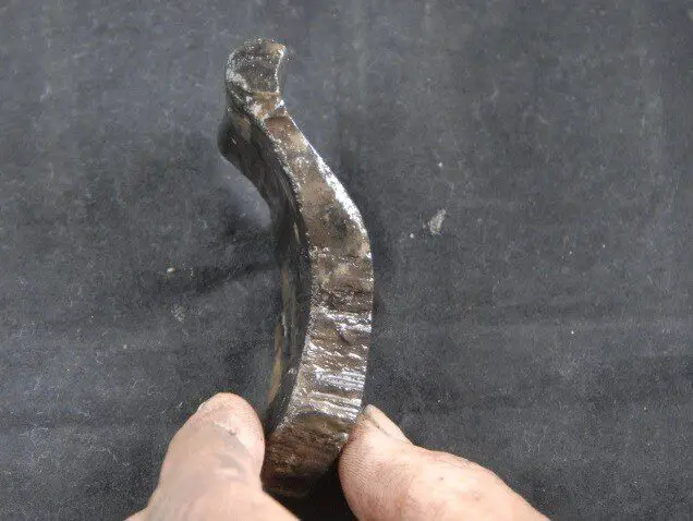 two thousand year old wooden bowl discovered in underground chamber beneath broch site.