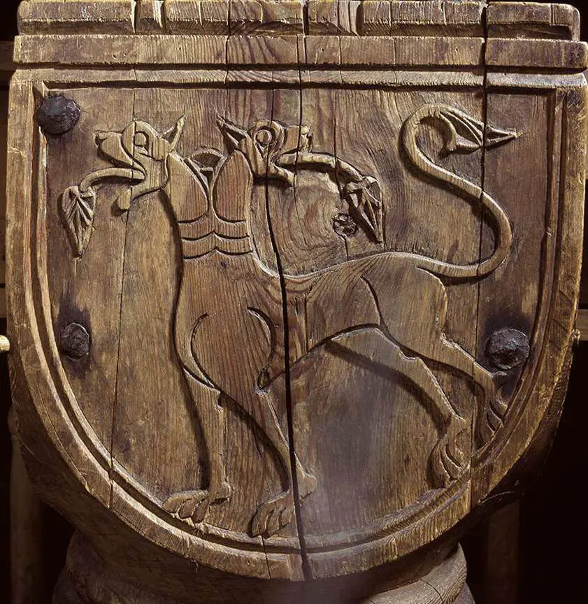 what do the animals carved into stave churches really mean?