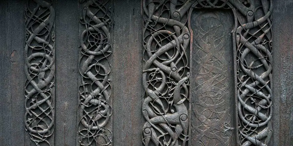 what do the animals carved into stave churches really mean?