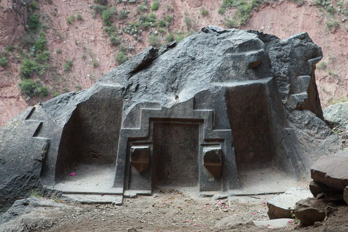 carved boulder with chakana motifs naupa iglesia