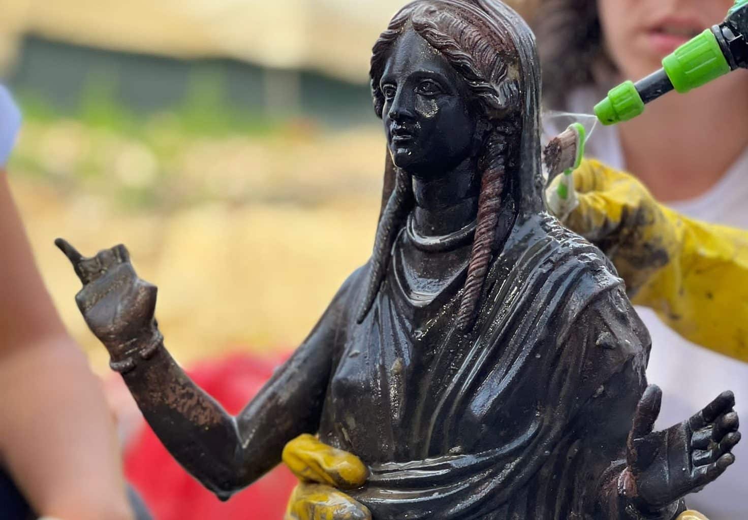 Ornate collection of ancient bronze statues discovered in Tuscany
