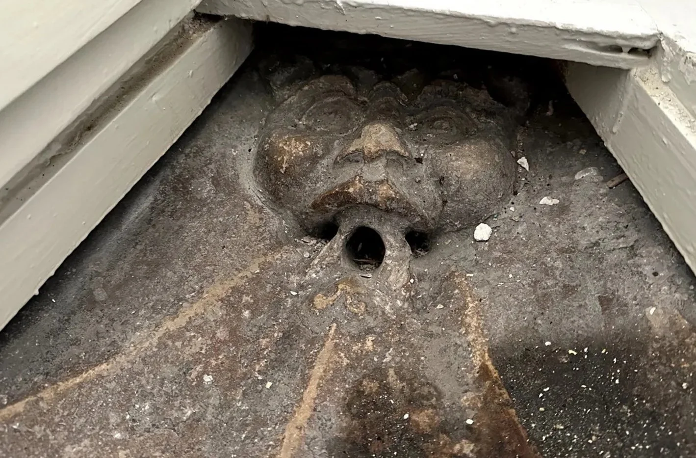 Medieval imp found in hidden trapdoor above toilet